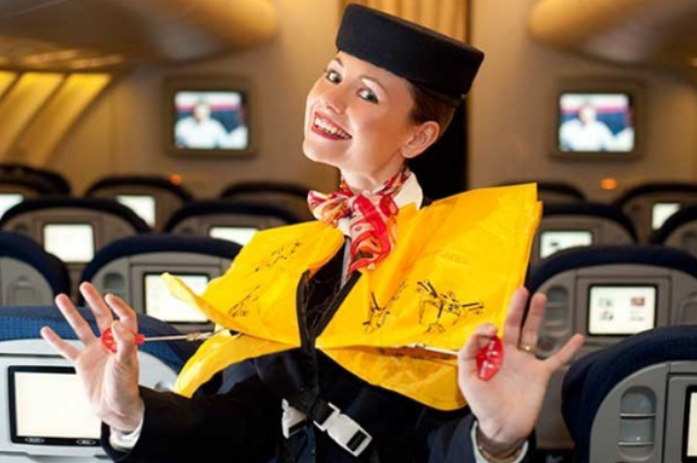An Image of a charming and smiling airhostess.